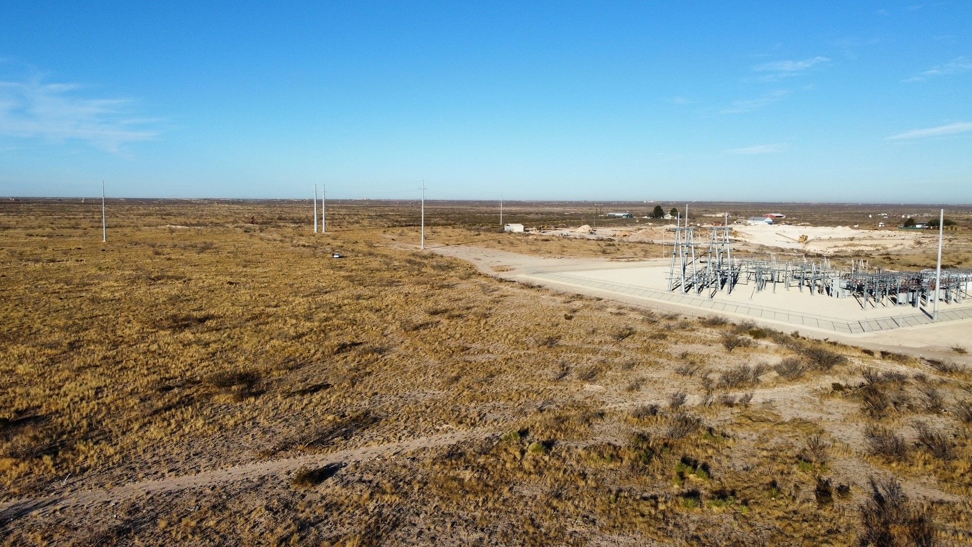 Aerial view of Texas land beside a substation