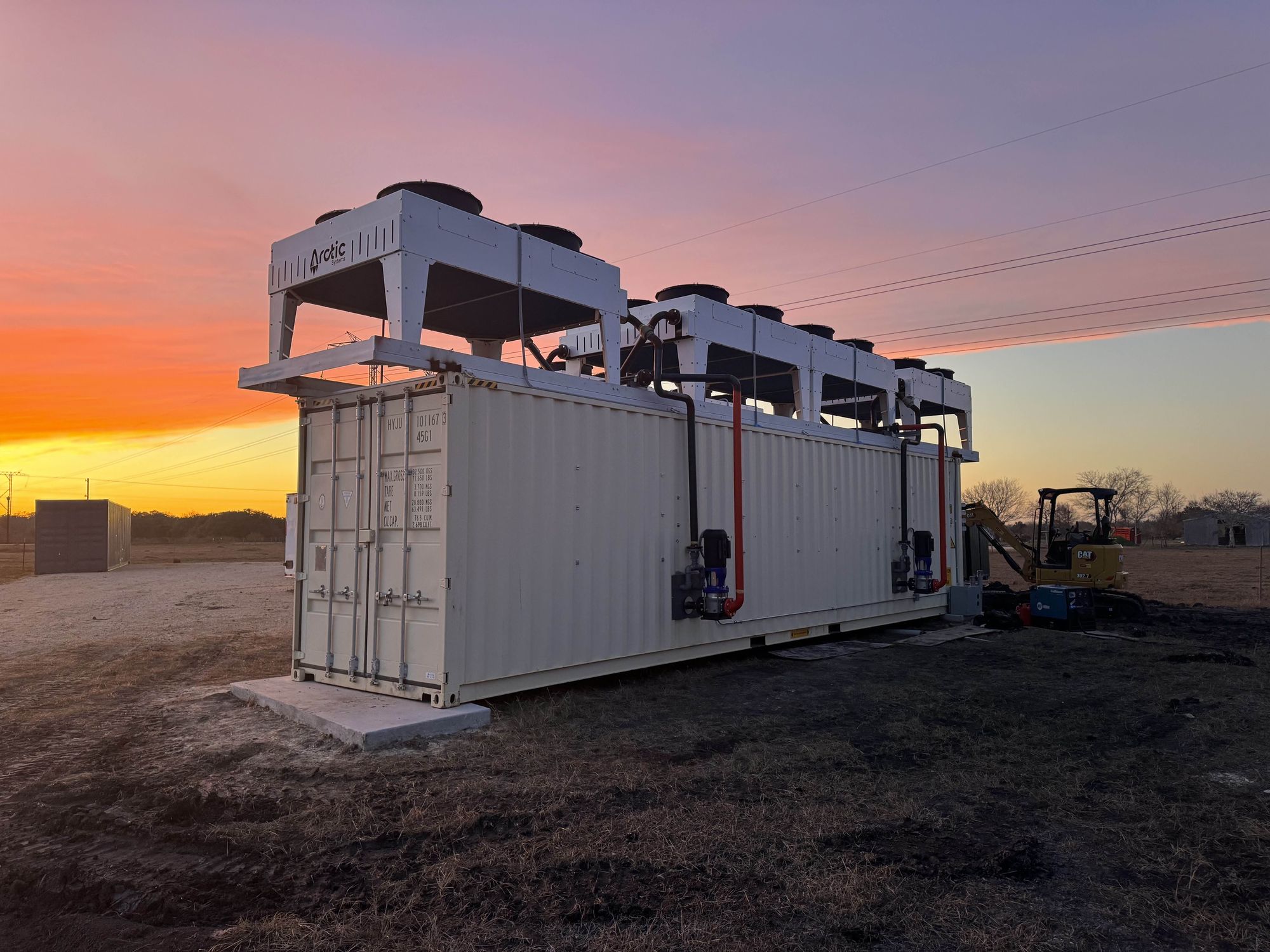 A Barrio Energy containerized site at sunset
